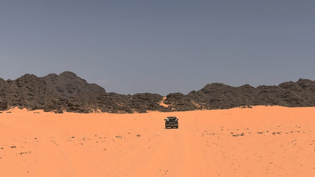 Red sand dunes of Tadrart Rouge during a Djanet Algeria Tour